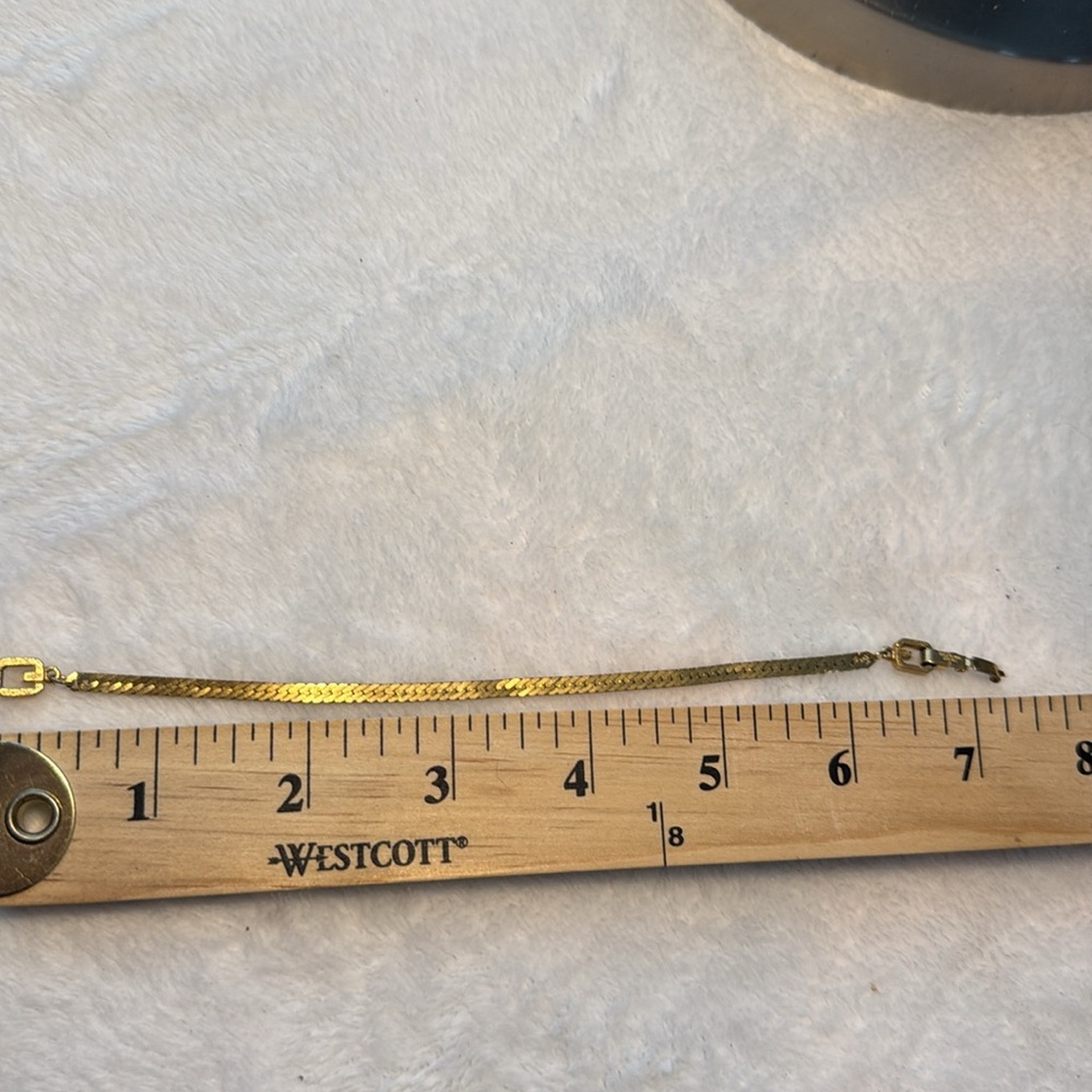 Louis Vuitton lock and key with Givenchy Gold Zipper Design Bracelet - Picture 7 of 7